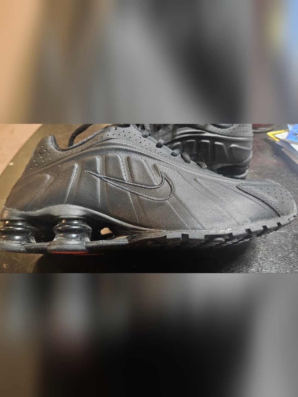 Men’s Black NIKE Shox Athletic Shoes with Visible Shox Cushioning